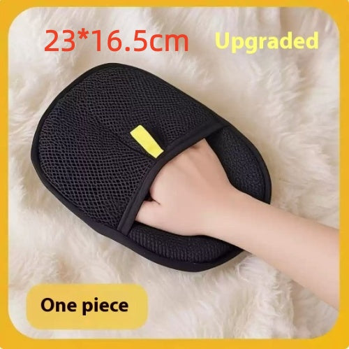 one piece black grooming glove measuring 23 by 16.5 centimeters on fur throw