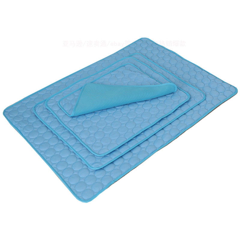 three blue cooling mats stacked in different sizes