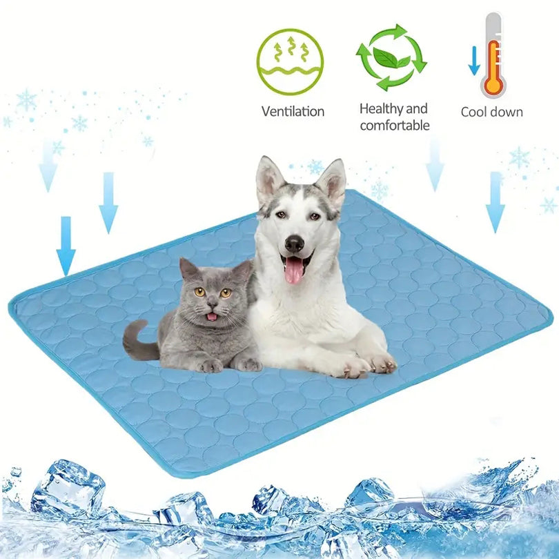 cat and dog lying together on blue quilted cooling mat with ventilation and cool down icons