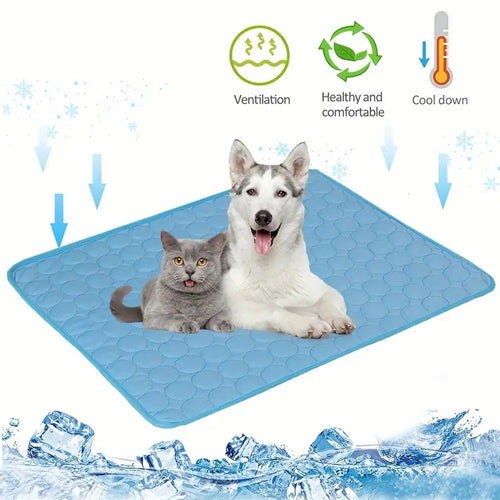 cat and dog lying together on blue quilted cooling mat with ventilation and cool down icons